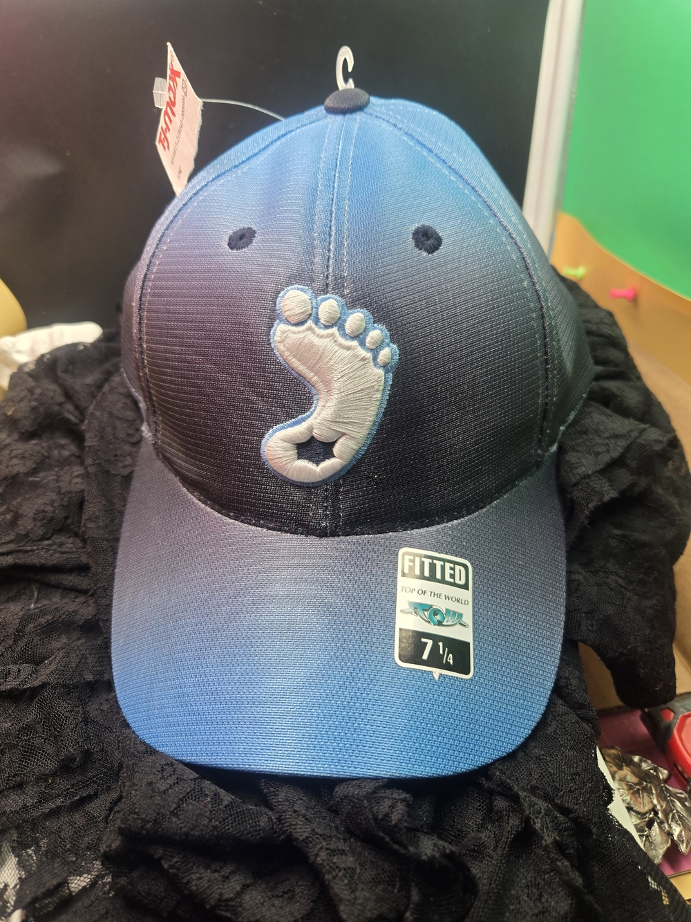Top of the World blue fitted North Carolina Tar Heels cap.